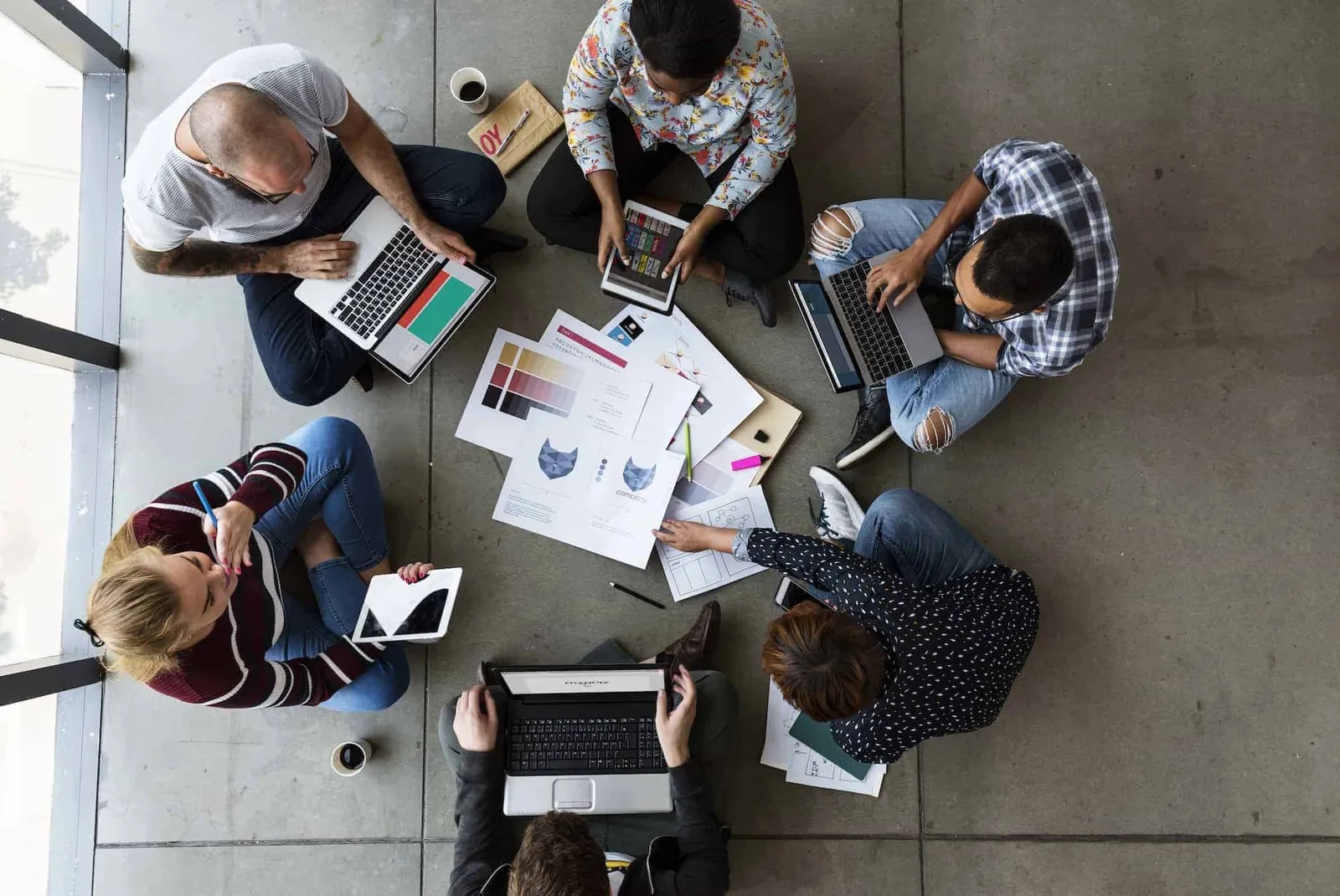 A diverse team collaborating during a focused meeting